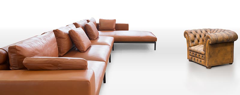 Sofá y sillón tapiazdos en piel
